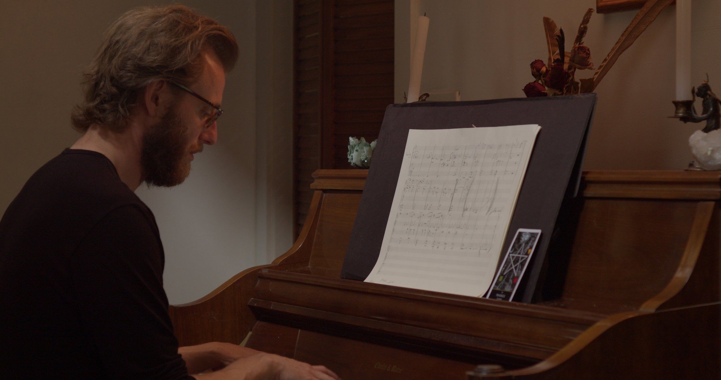 Cinematic portrait of Marshall McDaniel with a cello